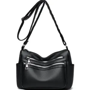 Sac bandoulière femme en cuir noir avec plusieurs fermetures éclair et grande capacité