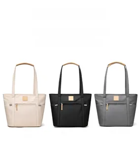 Detailed comparison of nylon tote bags in beige, black, and grey with front zipper