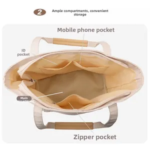 Internal view of the tote bag showing spacious main pocket and organized compartments