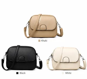 Detailed color display of khaki, black, and white crossbody bags with lychee texture