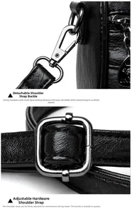 Detail of durable black pebbled leather strap with polished gunmetal spring hooks