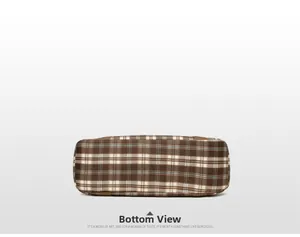 Detailed bottom view of large plaid tote bag showing durable fabric and precise stitching