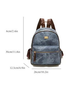 Blue denim backpack with vintage clover print, brown leather trim and size dimensions