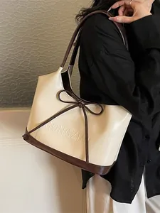 Sac fourre-tout minimaliste bicolore beige et marron avec noeud élégant