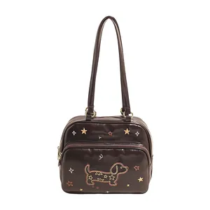 Sac à bandoulière marron foncé vintage avec broderie de teckel et d'étoiles
