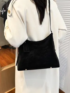 Minimalist black PU leather tote bag with large capacity shown in a stylish back view