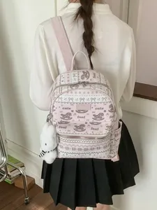 Chic light pink printed tote backpack for women with a cute plush bunny keychain
