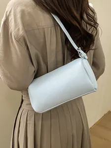 Fashionable light blue baguette bag with high-quality textured leather for women