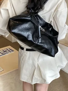 Vintage large capacity black tote bag with glossy wrinkled texture leather finish