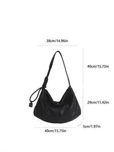 Black tote bag size guide showing dimensions 40x29x5cm with minimalist shoulder strap