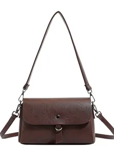 Minimalist dark brown square crossbody bag in textured PU leather with retro buckle strap