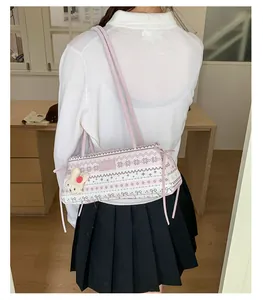 Sac Boston rose avec motifs de flocons de neige nordiques et breloque lapin en peluche