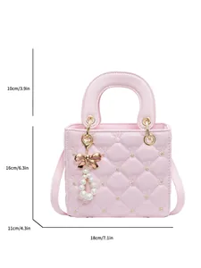 Sac bandoulière matelassé rose avec nœud doré et perles, dimensions 18x16x11cm