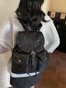 Stylish black star print backpack with flap closure and side pockets for casual use