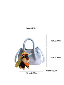 Light blue textured square handbag with dog charm and detailed dimension annotations