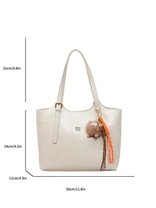 Cream white vintage tote bag with metal logo and dimensions 30x24x11cm shown on white background