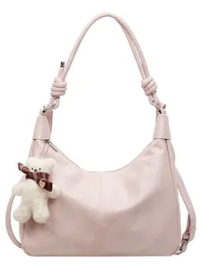Pink soft leather hobo tote bag with knotted shoulder strap and cute bear charm