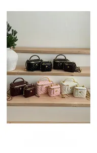 Quilted mini square bags in multiple colors with chain straps and gold flower hardware