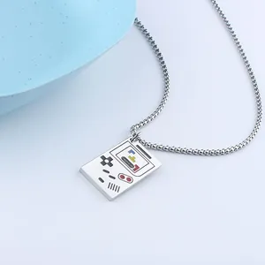 Close-up of retro handheld game console pendant on silver stainless steel box chain