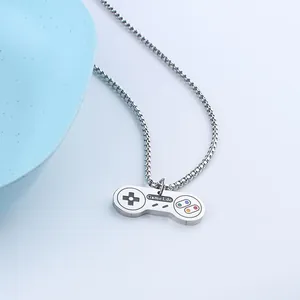 Detail of silver game controller pendant with colorful buttons on stainless steel chain