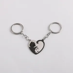 Matching cat heart couple keychain set in black and silver stainless steel finish