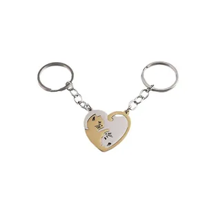 Matching cat heart couple keychain set in gold and silver finish stainless steel
