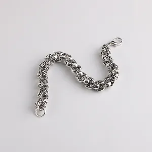Retro antique silver skull bracelet for men featuring a detailed S-curve link design