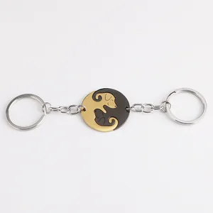 Cute dog couple keychain set in black and gold stainless steel with interlocking puzzle design