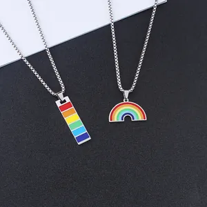 Detail of rainbow titanium steel pendants featuring rectangular and semi-circle designs
