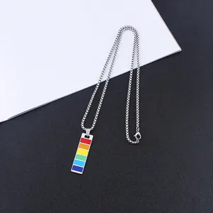 Close-up of rainbow pendant on silver box chain featuring vibrant enamel rectangles