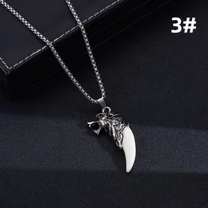 Retro wolf head necklace with tooth pendant and box chain on black jewelry display box