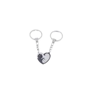 Matching stainless steel cat heart keychains for couples with yin yang design style
