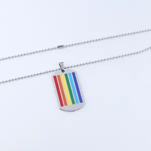 Detailed view of rainbow rectangle dog tag pendant with silver bead chain link
