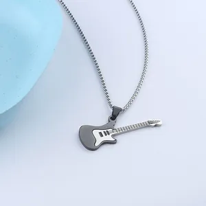 Detailed view of rock style stainless steel guitar pendant with black and white enamel