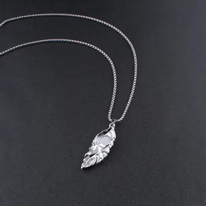 Detailed silver feather pendant with textured metal finish and high-quality box chain