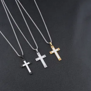 Two-tone titanium steel cross pendant necklaces in black, silver, and gold finishes
