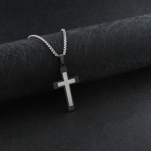Modern two-tone cross pendant necklace in black and silver stainless steel for men