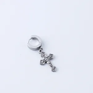 Minimalist stainless steel cross ear clip for men featuring a detailed crucifix pendant