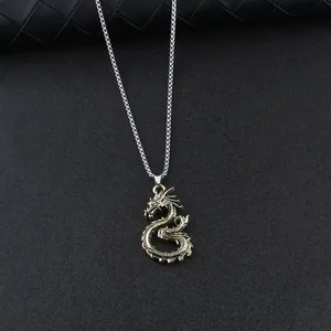Vintage gold dragon pendant necklace with detailed scales and silver steel square chain