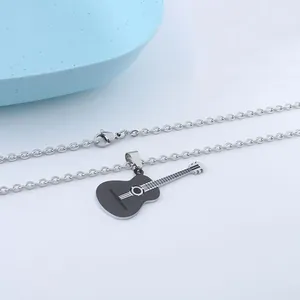 Detail shot of a black matte guitar pendant with silver steel chain and lobster clasp