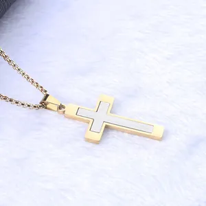 Two-tone titanium steel cross necklace with gold outer frame and silver matte inner cross