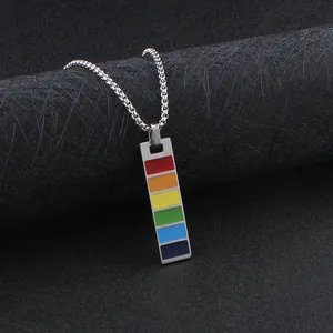 Macro shot of rectangular rainbow pendant necklace with stainless steel box chain