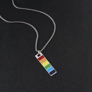 Macro shot of rectangular rainbow pendant on silver stainless steel box chain necklace
