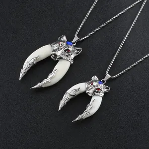 Detailed dimensions of wolf head pendants with red and blue rhinestone accents