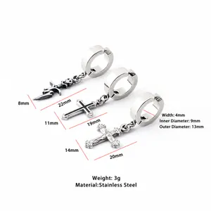 Detailed view of stainless steel hoop earrings with lightning and cross charms