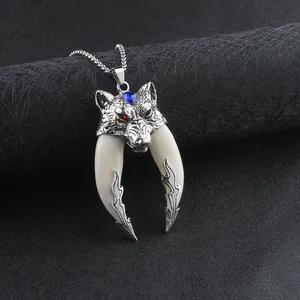 Vintage wolf head pendant necklace with blue gemstone and dual ivory-style tusks for men