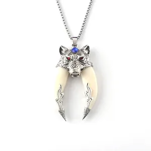 Vintage wolf head pendant necklace with double tusks and red crystal eyes on steel chain