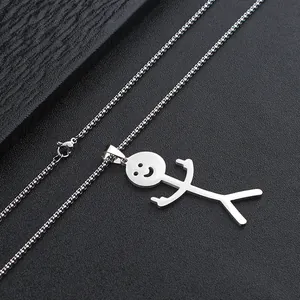 Close-up of polished stainless steel funny matchstick man pendant with smiley face and long chain