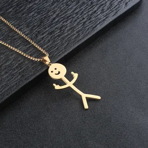 Golden stickman pendant necklace with a smiling face on a sleek black background