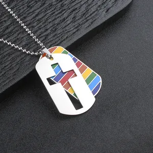 Macro view of double-layered stainless steel tag pendant with cross and rainbow stripes